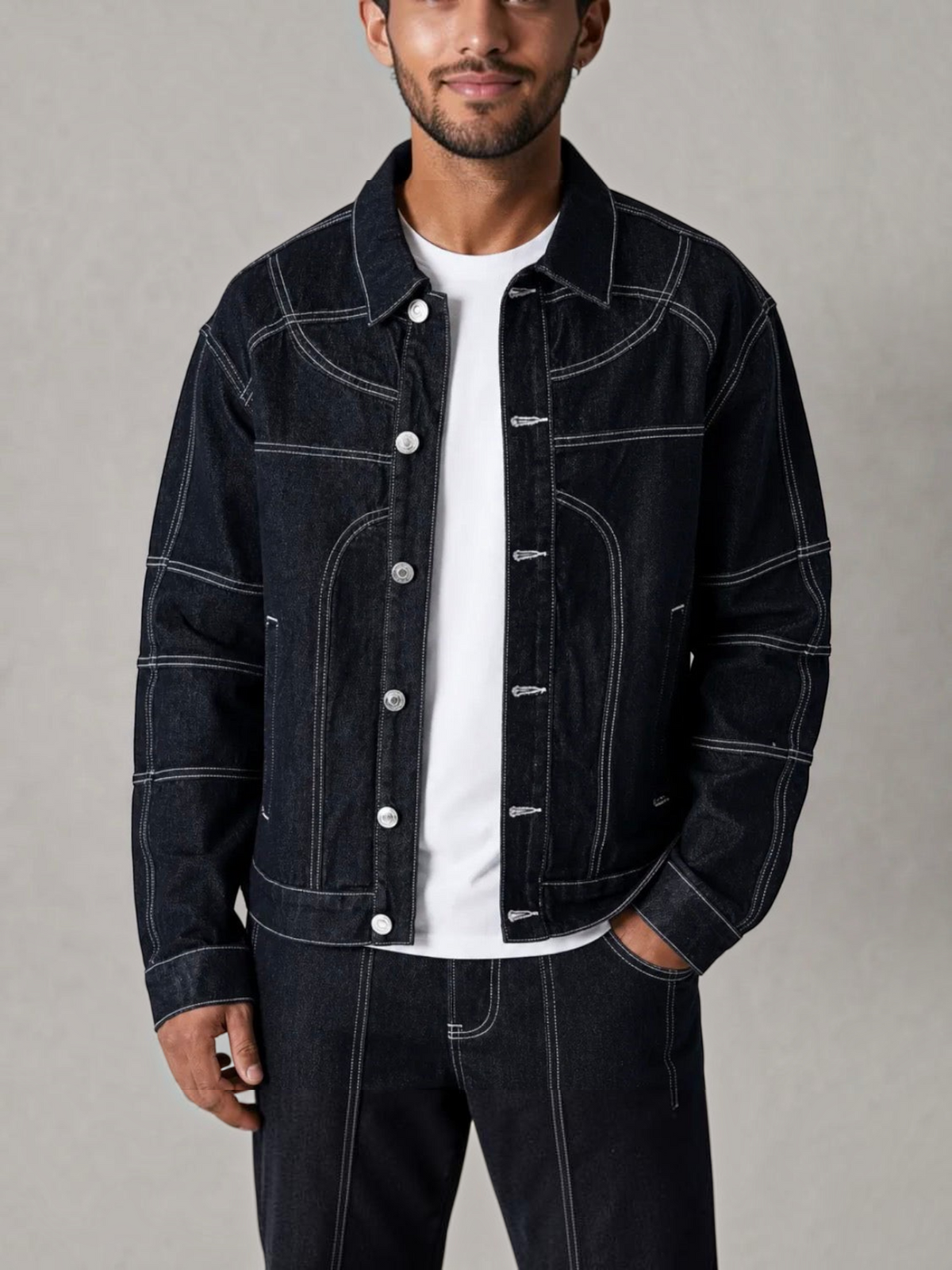 BROCK blue denim jacket and pants set with white contrast stitching worn by a man over a white t-shirt