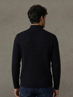 BROCK navy blue cable knit sweater with a mock neck collar worn by a man, back view