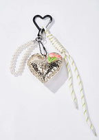 Grigri de sac cœur aux tulipes et perles ÉLINE L'ATELIER