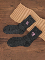 Chaussettes BROCK GALLANTRY noires pailletées avec broderie rose, style festif mi-mollet en tissu scintillant