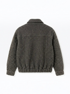 Back view of a BROCK textured short jacket in dark grey with a structured collar and elasticated hem.