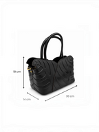 Sac à main BROCK GALLANTRY en cuir noir avec motif feuillage en relief et détails dorés, vue de profil