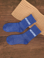 Chaussettes mi-mollet bleu scintillant BROCK avec inscription brodée MIGNONNE en tissu métallisé