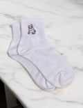 Chaussettes brodées lapin Éline l'atelier