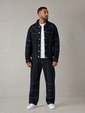 BROCK blue denim two-piece set with contrast stitching worn by a man with a white t-shirt and sneakers