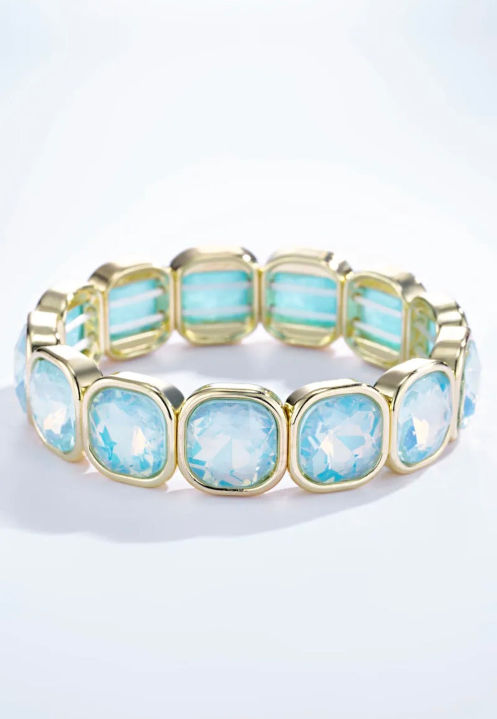 Bracelet élastique cristaux irisés multicolores monture dorée