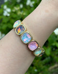 Bracelet élastique cristaux irisés multicolores monture dorée