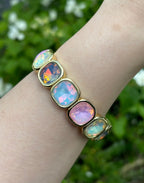 Bracelet élastique cristaux irisés multicolores monture dorée