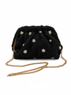 Pochette BROCK GALLANTRY en moumoute noire à pois beiges, forme arrondie avec chaîne dorée amovible.