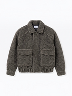 BROCK textured short jacket in dark grey with a structured collar, front flap pockets, and ribbed hem.