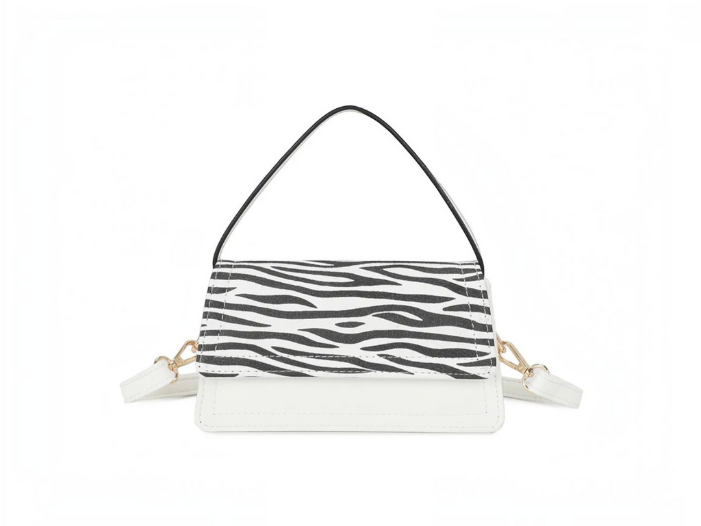 Sac à main BROCK GALLANTRY en PU blanc avec rabat à motif zébré, fermeture zippée et bandoulière amovible.