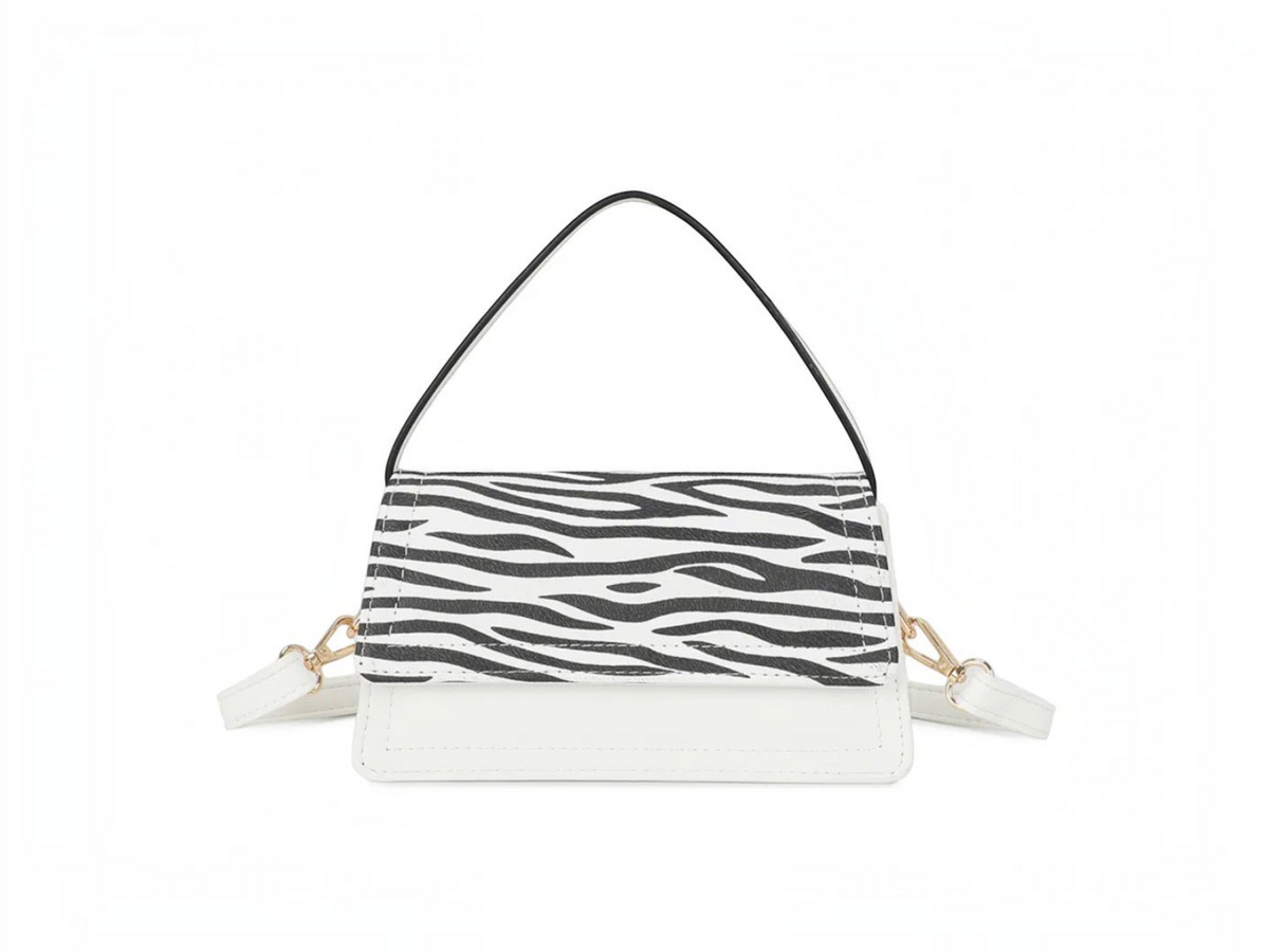Sac à main BROCK GALLANTRY en PU blanc avec rabat à motif zébré, fermeture zippée et bandoulière amovible.