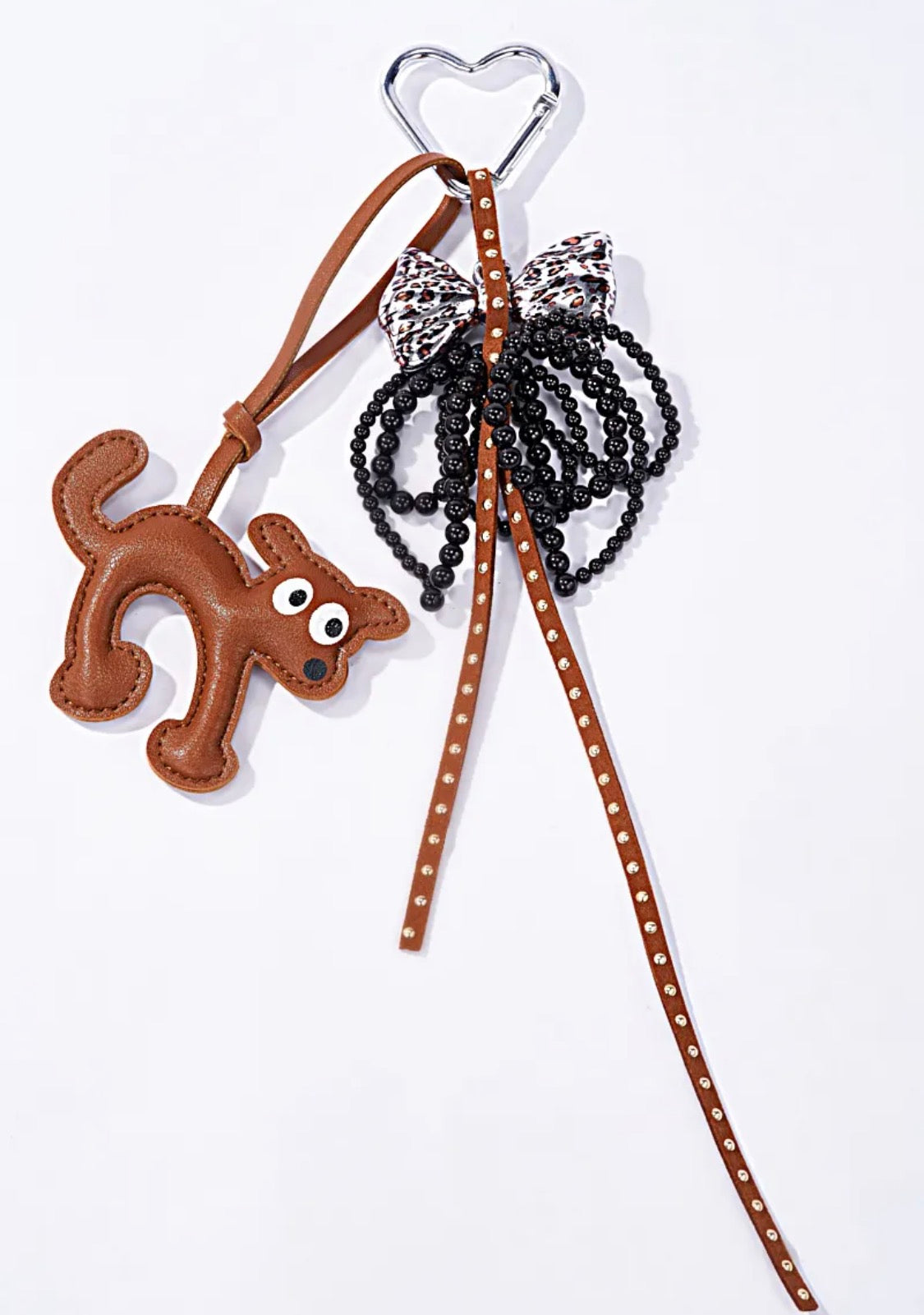 Grigri de sac chien, perles et nœud léopard ÉLINE L'ATELIER