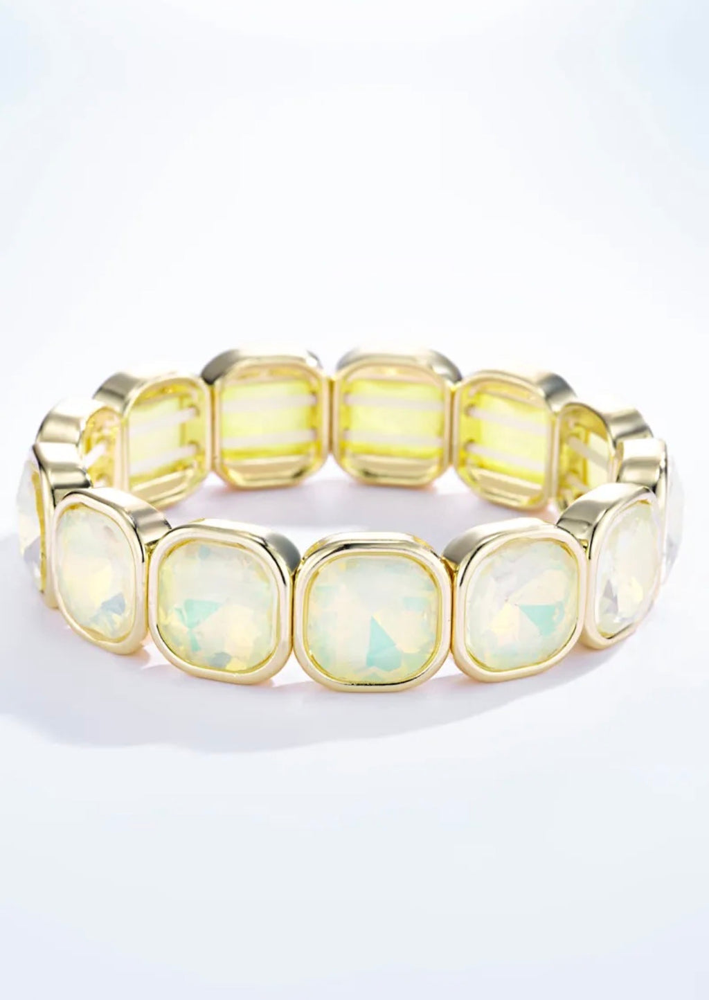 Bracelet élastique cristaux irisés multicolores monture dorée