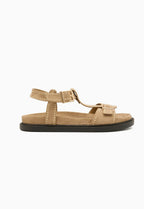 Sandales en daim avec semelle noire et bride cloutée