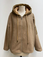 BROCK beige felted wool blend zip-up jacket with a quilted hood, drawstring, and utility sleeve pocket.