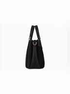 Sac à main noir BROCK GALLANTRY La Cyrielle en matière grainée et veloutée avec détails métalliques dorés, vue profil