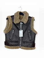 Veste sans manches à col en fausse fourrure et sangles