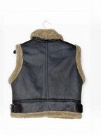 Veste sans manches à col en fausse fourrure et sangles