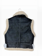 Veste sans manches à col en fausse fourrure et sangles