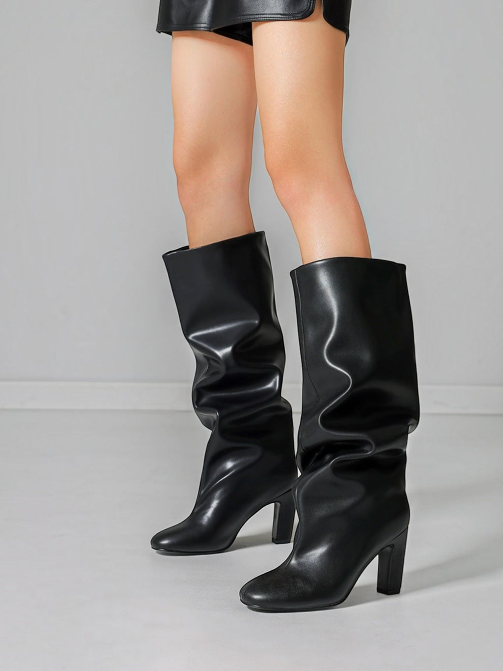 Bottes hautes au style drapé STEPHAN PARIS