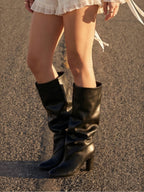 Bottes hautes au style drapé STEPHAN PARIS