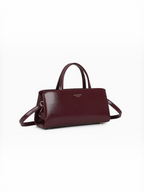 Sac à main BROCK GALLANTRY La Rivance bordeaux brillant à anses et bandoulière, design minimaliste et élégant.