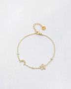 Bracelet BROCK en acier inoxydable doré avec motifs lune et trèfle sertis de cristaux brillants sur chaîne fine