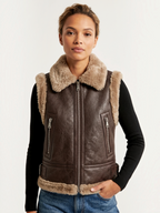 Veste sans manches à col en fausse fourrure et sangles