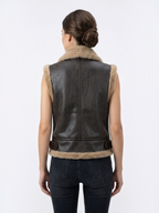 Veste sans manches à col en fausse fourrure et sangles