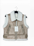 Veste sans manches à col en fausse fourrure et sangles