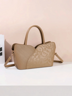 Sac à main BROCK GALLANTRY beige en polyuréthane avec motifs ton sur ton, anses et bandoulière amovible.