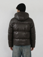 BROCK men's dark brown faux leather hooded puffer jacket worn with a black beanie, back view
