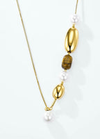 Collier asymétrique doré ÉLINE L’ATELIER