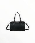 Sac Bowling GALLANTRY

Élégant et polyvalent, le Sac Bowling GALLANTRY allie style contemporain et praticité au quotidien. Sa silhouette structurée en simili cuir de qualité s'adapte aussi bien à une tenue casual qu'à un look plus habillé.