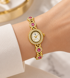 Montre Bruna dorée à boîtier ovale et bracelet orné de pierres FASHION TIME