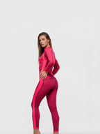 Model wearing BROCK ANAISSA Acro seamless compression sportswear set in vibrant pink with ergonomic 3D design