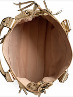 Interior view of a BROCK BAGSTORY gold faux leather A4 tote bag with a spacious lined compartment