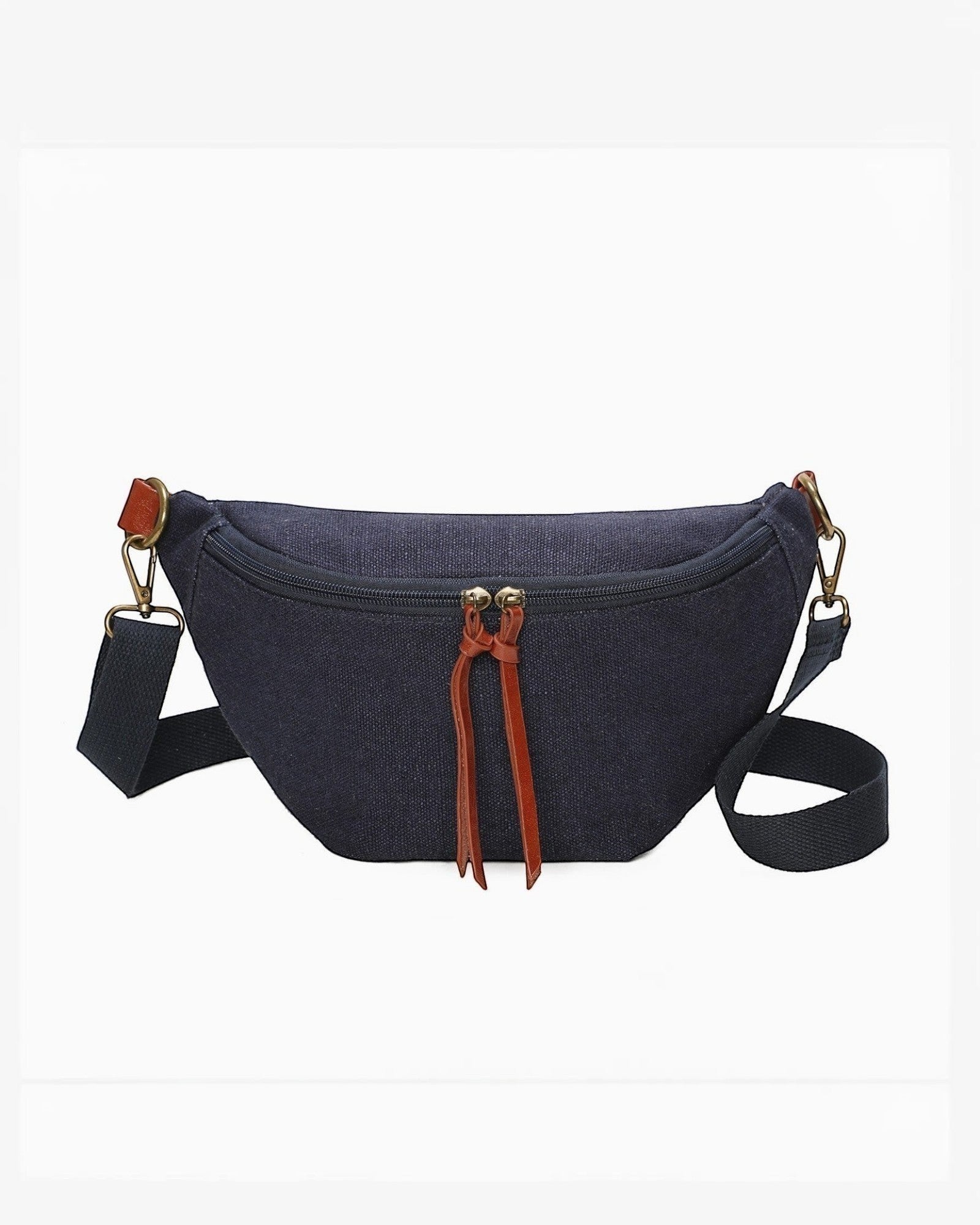 Banane INES DELAURE en toile bleu marine et PU marron, avec deux poches zippées et détails en cuir. Idéale pour un usage quotidien.
