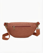Banane zippée INES DELAURE en toile et PU marron, pratique pour un usage quotidien.