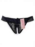 BROCK BELLE COM'ELLE black lace thong with decorative white pearls and small bows on a white background
