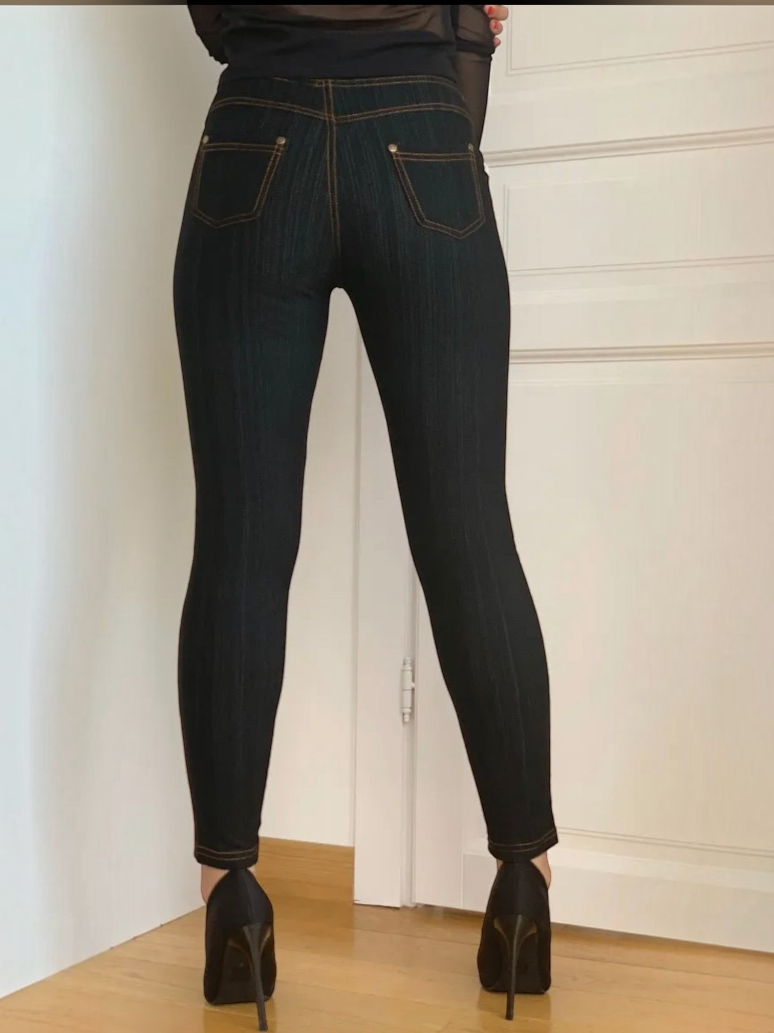 BROCK BELLE COM'ELLE black shaping leggings with denim-look stitching worn with high heels, back view