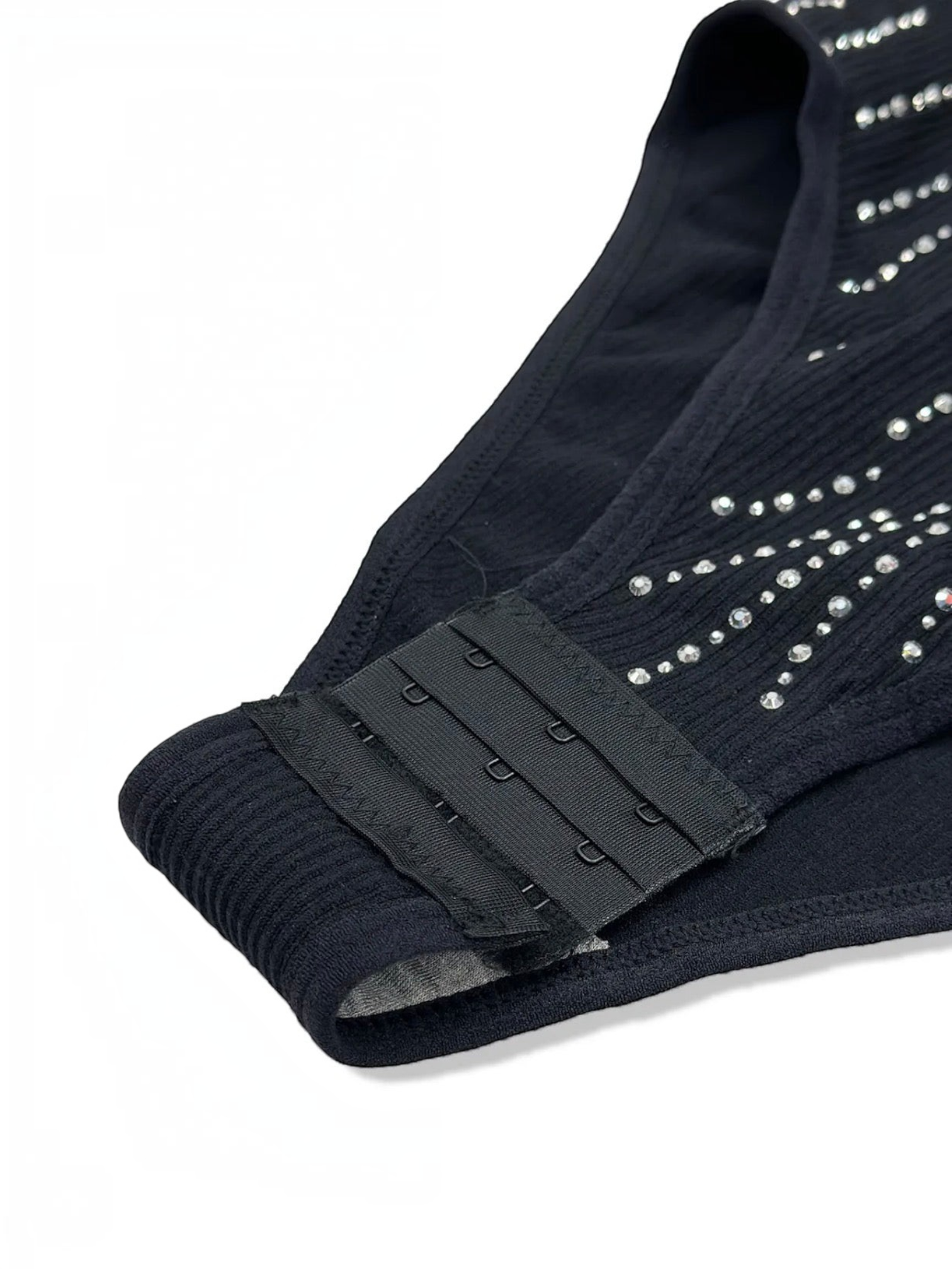 BROCK BELLE COM'ELLE black ribbed bodysuit featuring sparkling rhinestone details and a hook-and-eye closure