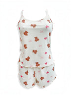 BROCK BELLE COM'ELLE two-piece pajama set in cream with brown teddy bear and pink heart print, ribbed fabric.