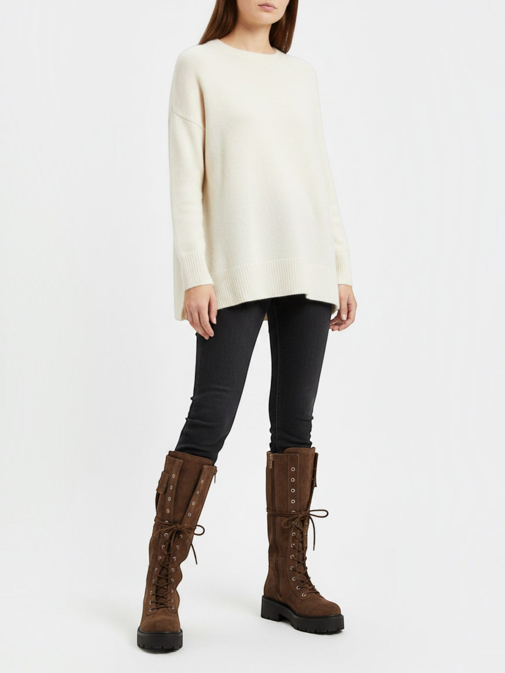 BROCK brown suede lace-up biker boots with thick lug soles and decorative pockets worn by a model