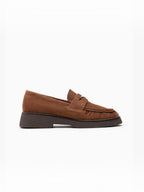 BROCK brown suede loafers with gathered front detail, gold metallic accent, and low block heel for casual chic style.