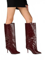 BROCK burgundy patent faux leather knee-high boots with crocodile texture, pointed toe, and slim stiletto heel.
