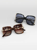 BROCK BYREN | ÉLINE L'ATELIER sunglasses in black and tortoiseshell with gold-tone metal accents and gradient lenses.