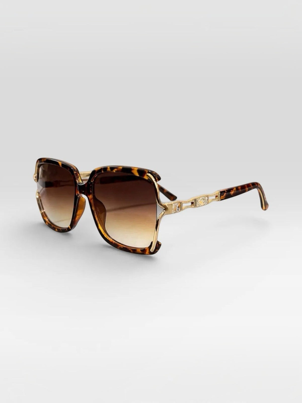 BROCK BYREN | ÉLINE L'ATELIER tortoiseshell sunglasses with gold metal temples and gradient brown lenses