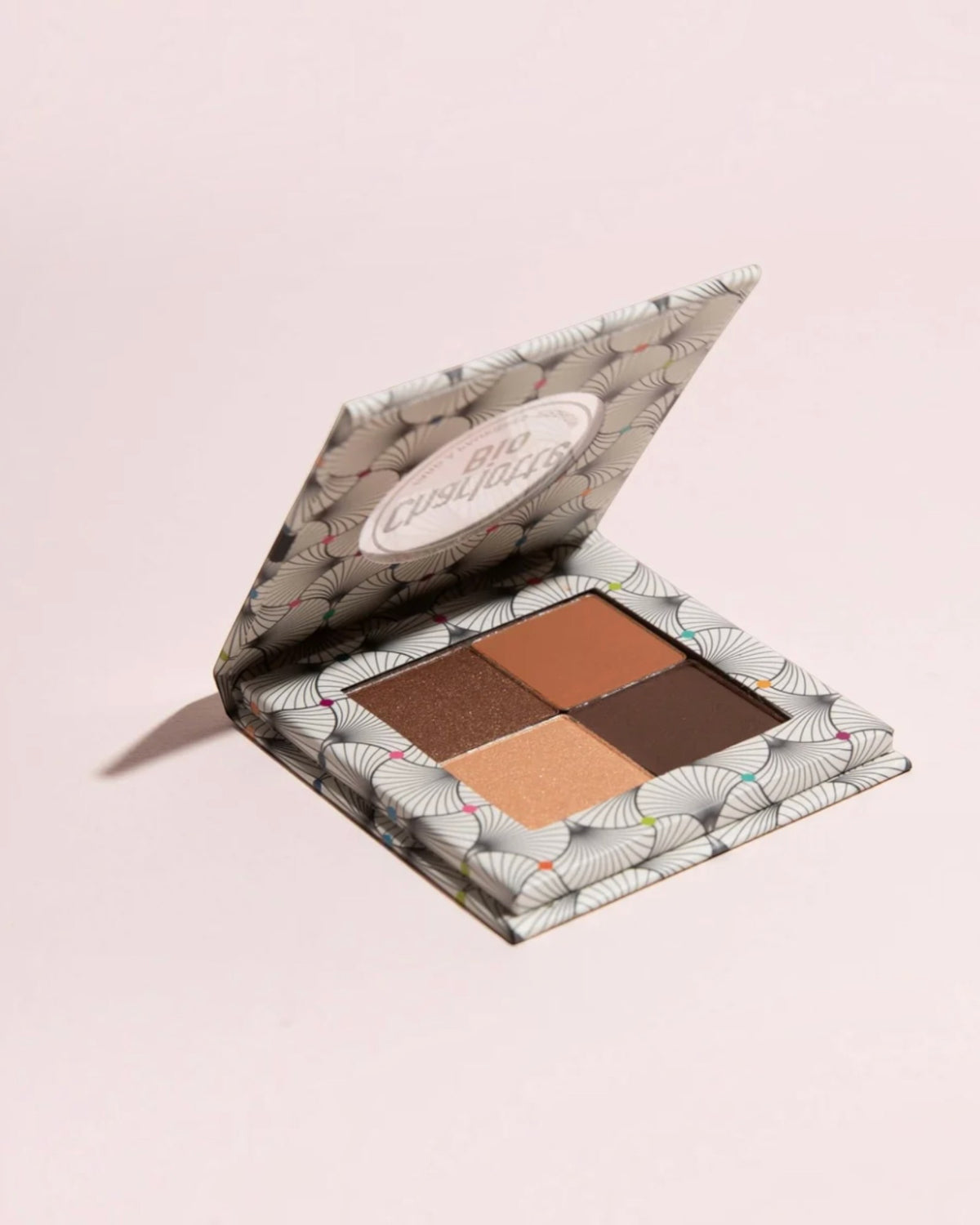 BROCK Charlotte Bio eyeshadow palette with four neutral brown and gold shades in a patterned compact case